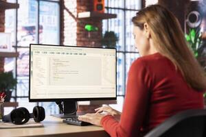 Woman typing prompts into an AI powered chat system on her computer, advanced virtual assistant showcases futuristic algorithms and smart solutions for productivity and connectivity. photo