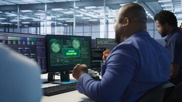 Data scientists receive access granted notification while reconfiguring server hub, optimizing it. Team of IT experts ensures data center operates efficiently, successfully eliminating all errors photo