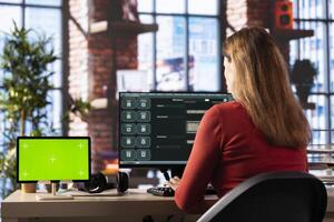 Focused woman using AI chatbot to generate real time responses next to copy space screen, power of artificial intelligence. Smart automation simplifying online communication and problem solving. photo
