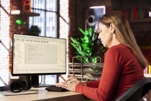 Focused person interacting with a chatbot interface on computer, AI system leverages machine learning and automation to generate helpful responses. Improve online data driven workflow. photo
