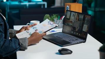 Employee working from home doing business meeting videocall with manager requesting to see financial charts. Teleworker in remote teleconference call with team leader showing task progress, camera A photo