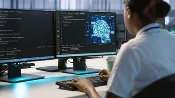 Engineer in data center implementing advanced AI driven predictive maintenance systems to proactively identify and resolve potential hardware failures before they impact operations, camera A photo