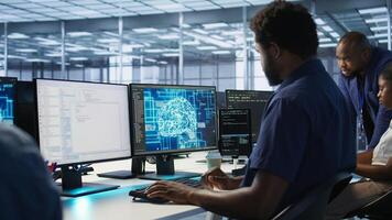 Machine learning expert in AI server room developing disaster recovery plans ensuring minimal downtime. Employee monitoring performance in artificial intelligence ran data center, camera A photo