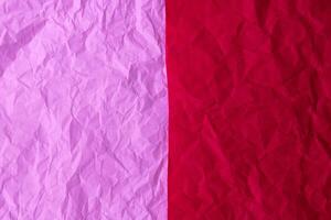 The texture of the background is made of crumpled red and pink paper photo