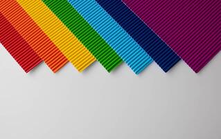 Background of multicolored corrugated colored paper with a place for text. photo