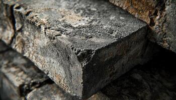 A Close Up View Of Dark Rough Textured Blocks photo