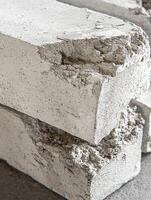 Closeup view of damaged concrete blocks showing texture photo