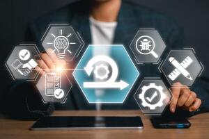 Businessman engaging with digital interface representing agile development, showcasing innovation and technology in modern business practices. photo