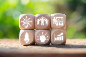 Inspiring 'Learn and Lead' Concept with Wooden Blocks Illustrating Growth, Innovation, and Leadership in a Natural Setting photo