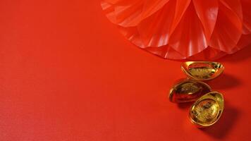 Chinese New Year Gold Ingots and Paper Lantern photo