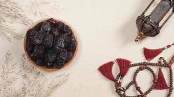 Lantern, A Plate of Dates, and A Prayer Beads photo