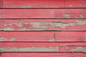 Weathered red wooden planks telling stories of time in a rustic setting. photo