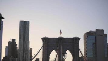 A serene view of the Brooklyn Bridge with Skyline at Dusk in New York video