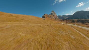 Smooth flight along the mountain range, filmed by FPV drone. Seceda, Italy video