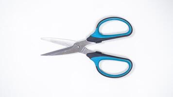 Top View of Open Scissor Isolated on White Background photo