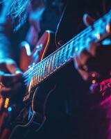 Electrifying Guitar Performance A Close-Up of a Musician's Passionate Play on Stage under Vivid Lighting photo