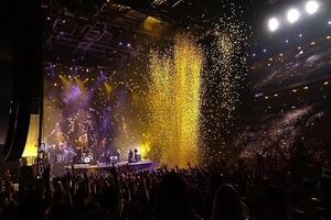 Epic Concert Experience A Night of Music, Lights, and Celebration in a Packed Arena photo