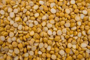 Full Frame View of Split Chickpeas Chana Dal Lentils photo