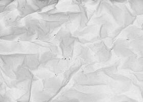 crumpled grey paper texture background photo