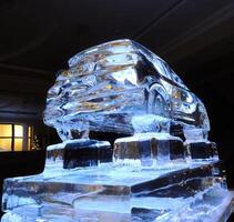 Vehicle design presentation stock photo. Rear part of car model made from ice on the ice platform photo