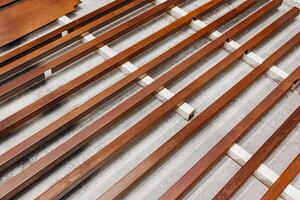 Natures Palette A Canvas of Weathered Wooden Slats, Each Telling a Story of Time and Textures Amidst Soft Shadows. photo