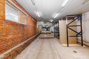 Symphony of Stacked Potential An Expansive Indoor Space Where Industrial Elements Merge with Minimalist Design. photo