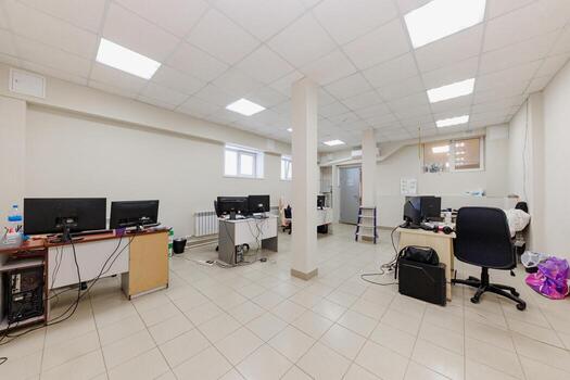 Modern Workspace A Clean, Efficient Office Setting Filled with Computers and Organized Desks for Productivity and Collaboration. photo