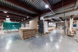 Inside the Workshop A Symphony of Stacked Wood and Whirring Machines, Where Craftsmanship Meets Industrial Precision photo