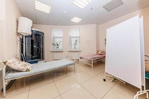 Serenity in Care A Tranquil Medical Room with Twin Beds and Essential Equipment for Healing photo