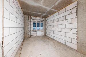 Raw Horizons An Unfinished Space Awaits Transformation Beneath the Echo of Concrete and Light. photo
