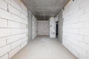 Raw Beginnings A Glimpse into the Heart of Construction Unfinished Walls and Concrete Floors Await Their Transformation. photo