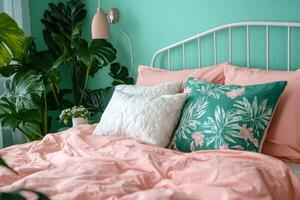 bedroom with a mint wall, pink bed and white decorative pillows, creating an atmosphere of freshness and tenderness photo