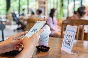 scan QR code for order menu in cafe restaurant with a digital delivery. Choose menu and order accumulate discount. E wallet, technology, pay online, credit card, bank app. photo