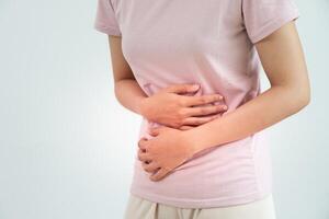 indigestion, gastritis, menstrual cramps, flatulence, diarrhea, distention, colon cancer, belly inflammation problem, suffer food poisoning, abdomen. photo