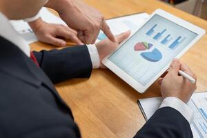 Business men calculate benefit, spreadsheets, graph financial development, bank accounts, statistics, economy, data analysis, investment analysis, stock exchange,Interest rates photo