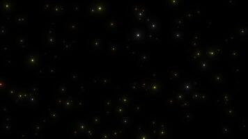 Swinging shimmering particles on a black background. Abstract animation. video