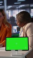 Vertical Group of businesswomen sharing insight on a new project next to copy space, collaborating to achieve global enterprise success in a men dominated professional environment. Camera B. video