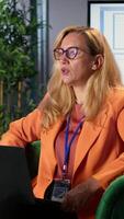 Vertical Female officials in a corporate environment sharing big ideas and strategies for career development, achieving goals in a men dominated world. Multicultural team exemplifying leadership. Camera A. video