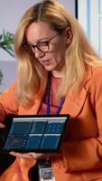 Vertical Diverse team of ambitious bosses strategizing a project to increase budget in a high end office. Leadership, ambition and gender equality drive business success in a work environment. Camera A. video