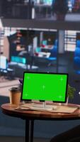 Vertical Multiethnic team of experts sharing insight next to chroma key screen, evaluating the performance metrics of the company and the staff. Female leaders analyzing data infographics. Camera A. video