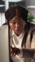 Vertical Business staff working together to review financial forecasts and analytics, doing a brainstorming session with archived documents for project development. Achieving goals for growth. Camera A. video