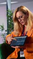 Vertical Diverse team of ambitious bosses strategizing a project to increase budget in a high end office. Leadership, ambition and gender equality drive business success in a work environment. Camera B. video