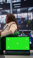 Vertical Multiethnic group of women working together next to copy space display, ensuring a successful project in a men dominated business industry. Leaders sharing insight on their plans. Camera B. video