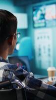 Vertical Specialist and patient discussing diagnostic results in a modern medical office, establishing advanced healthcare technology to present x ray imaging results and MRI scans. Care management. Camera B. video