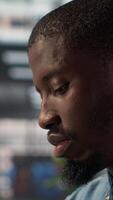 Vertical Employee feels emotional strain and frustration of business failure, disappointment and challenges. Man goes through a crisis with mental exhaustion to find solutions for the struggles. Camera A. video