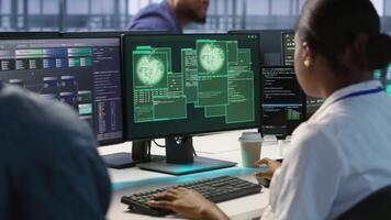 Woman requesting help from cybersecurity team after seeing security incidents affecting data center network system, protecting infrastructure from hacker attacks, camera A video