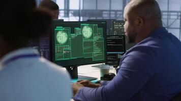Surprised data center technician celebrating after successfully managing to install cybersecurity framework, reducing security incidents and enhancing data protection protocols, camera A video