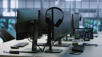 Artificial intelligence applications used in data center workplace to maintain company network equipment, handheld camera shot. AI programs used in server room to ensure optimal system performance video