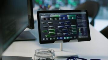 Close up of tablet in data center workspace used for controlling company network infrastructure. Focus on coding software on device in server room used to ensure optimal system performance video