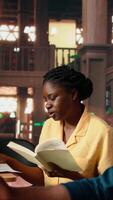 Vertical Diligent students reciting poetry together at the campus library, studying for a literature exam. Team of pupils showcasing productivity and commitment for self improvement. Camera A. video